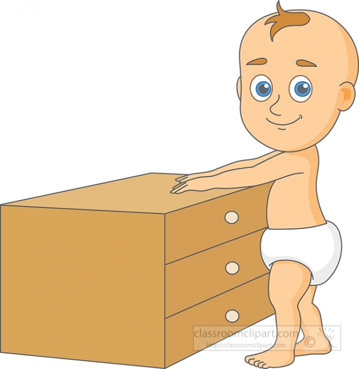 baby standing holding on furniture