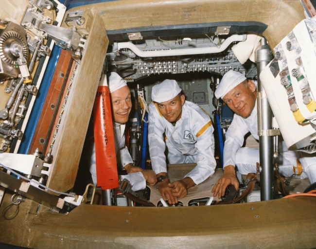 apollo 11 crew poses for a photograph during a walk through egre