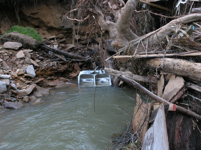 flood water along riverbank hurricane 16