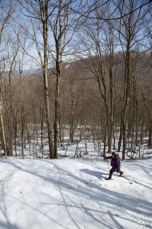 man wearing snow shoes on snowy day in west virginia