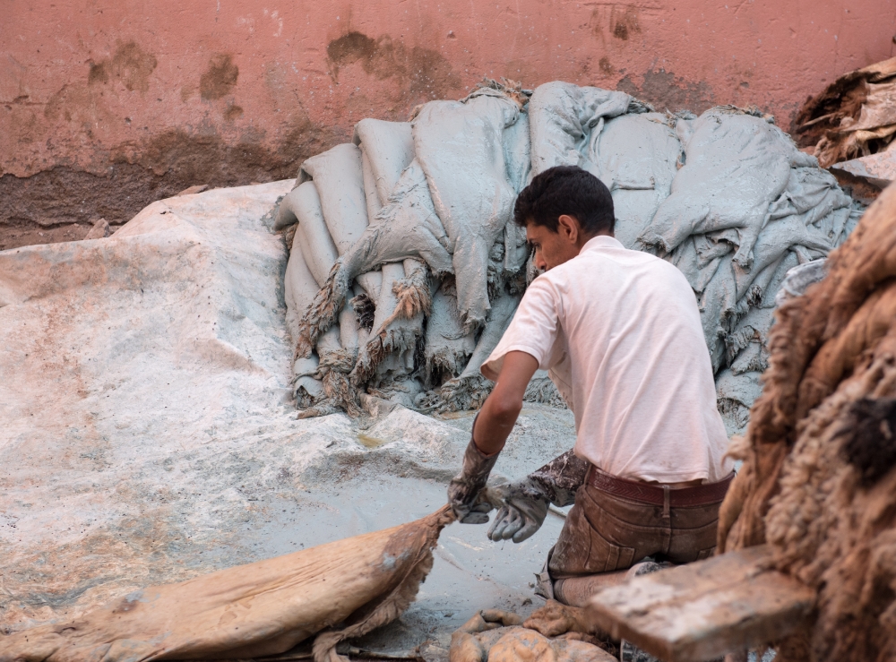 Person at work in the Leather Tannery Morocco photo image 6818