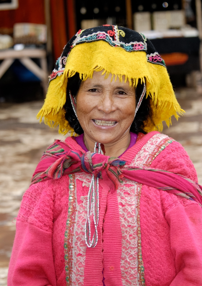 Peruvian local woman in colourful clothes