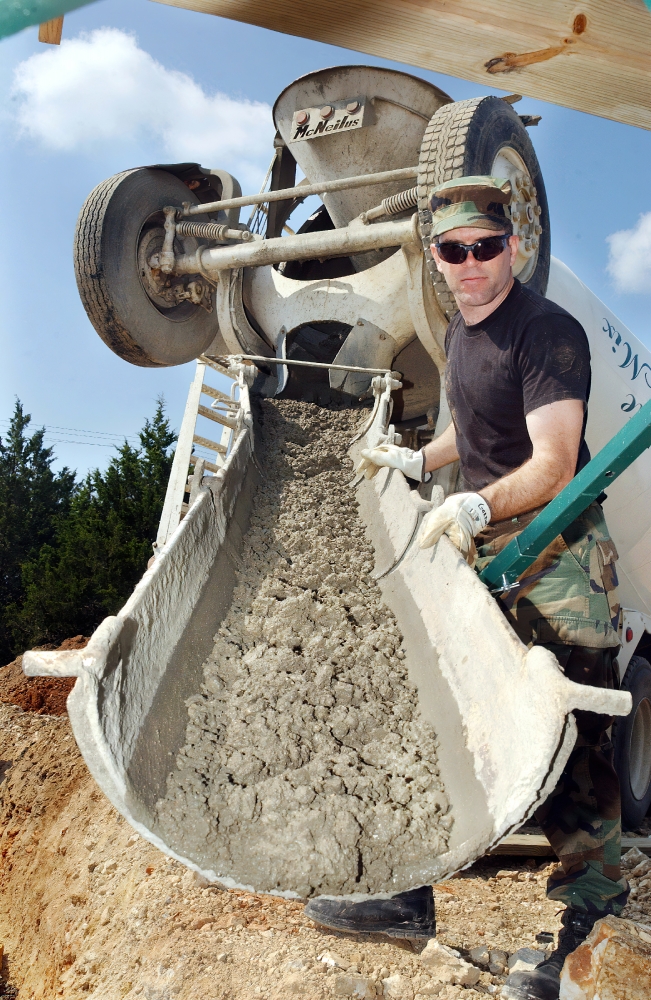 pouring of concrete to protect an electrical conduit