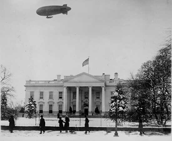 The C 7 blimp passing over the White House 1921