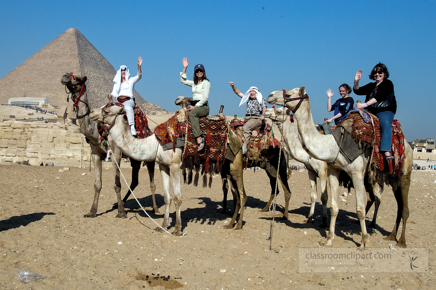 tourist riding camels near pyramids egypt-1775