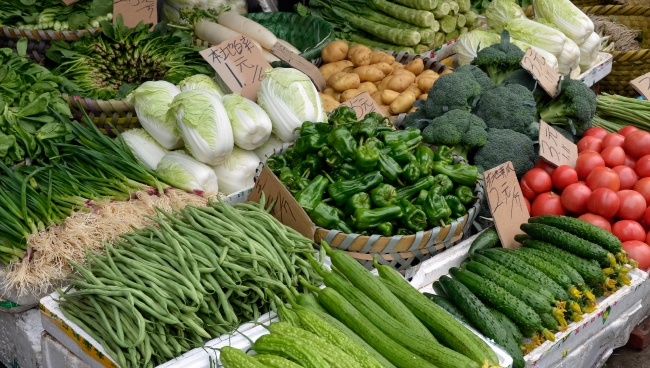 Various Baskets Of Fresh Vegetables At Outdoor Market Photo Imag