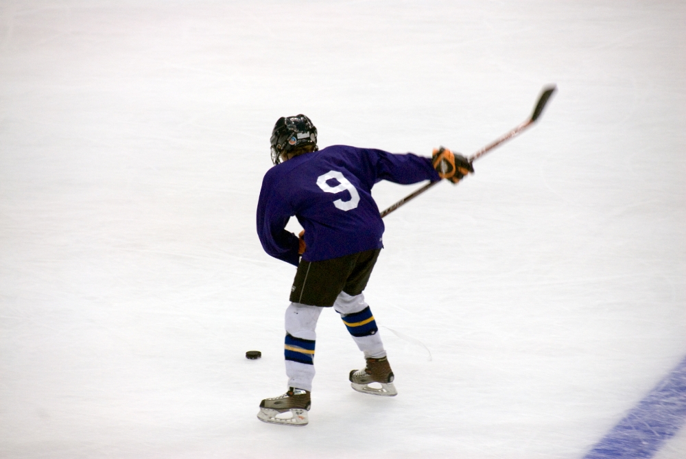 young hockey players practicing ice