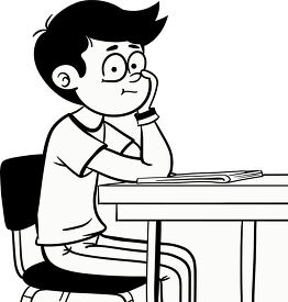 boy sits at a desk in a classroom looking thoughtful