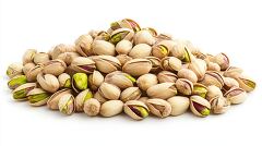 Pistachio nuts in various stages of opening