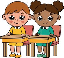 Two children smiling and sitting at their desks