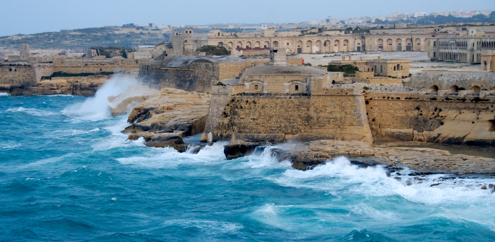 rough sea around the outside of the city walls of Valletta malta