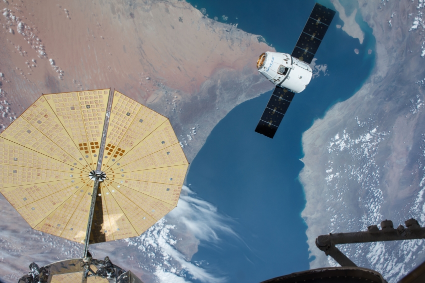 spacex dragon cargo craft arrives at iss