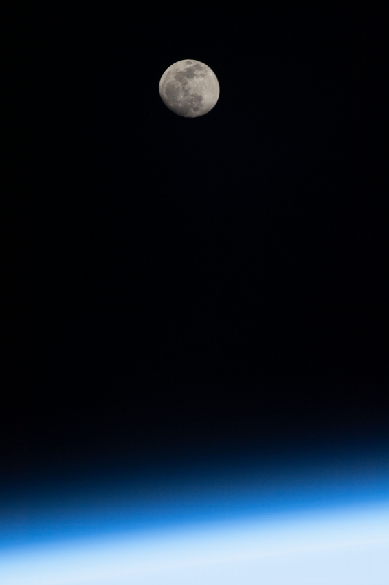 the waxing gibbous moon above earths horizon