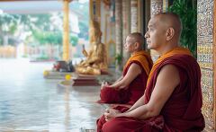 Monks Engage in Meditation Inside a Myanmar Temple