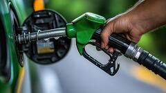 Refilling Gas Tank at a Service Station in the Afternoon