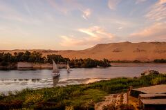 Sailboats Glide Along the Nile River Near Aswan Egypt