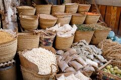 Vibrant Spice Market in Aswan Egypt With Woven Baskets