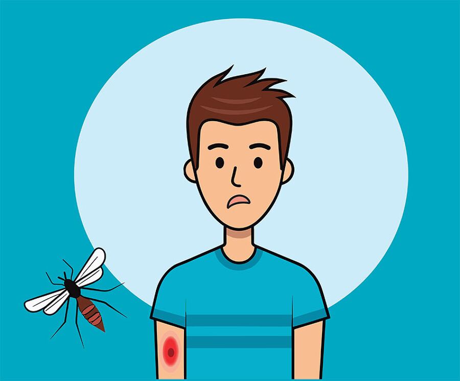 A young boy shows a surprised expression after getting bitten by a mosquito on his arm