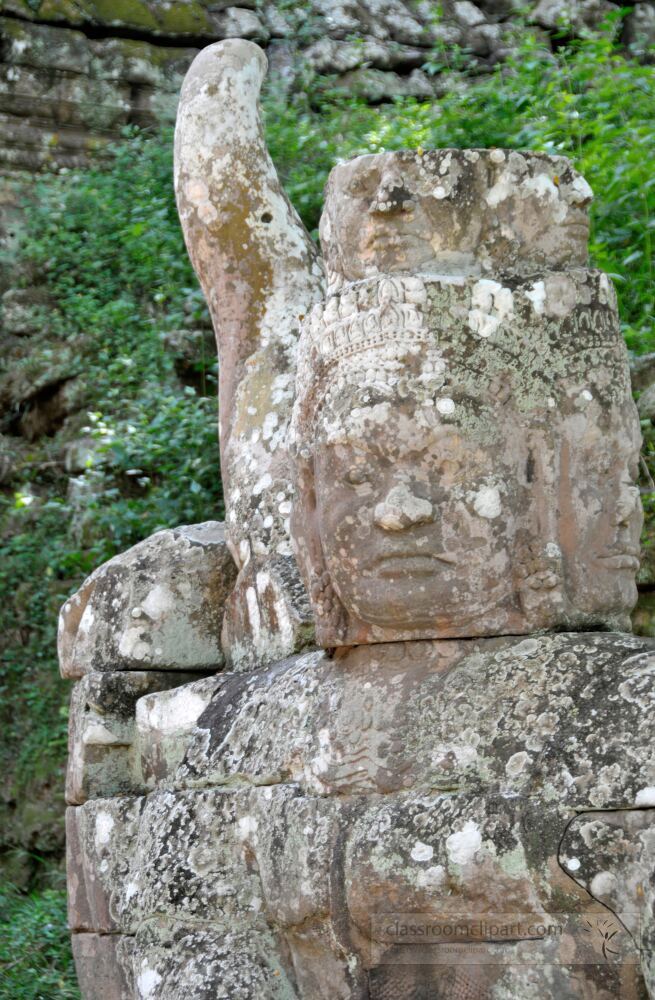 Intricate stone figures reflect the artistry of Khmer civilization at Angkor Wat in Siem Reap. Nature intertwines with history showcasing the timeless beauty and cultural significance of this sacred site.