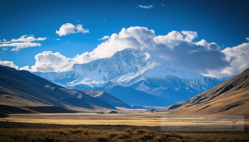 Towering peaks of snow capped mountains rise against a brilliant blue sky, casting shadows over golden grasslands below. A tranquil moment in the breathtaking Tibetan wilderness.