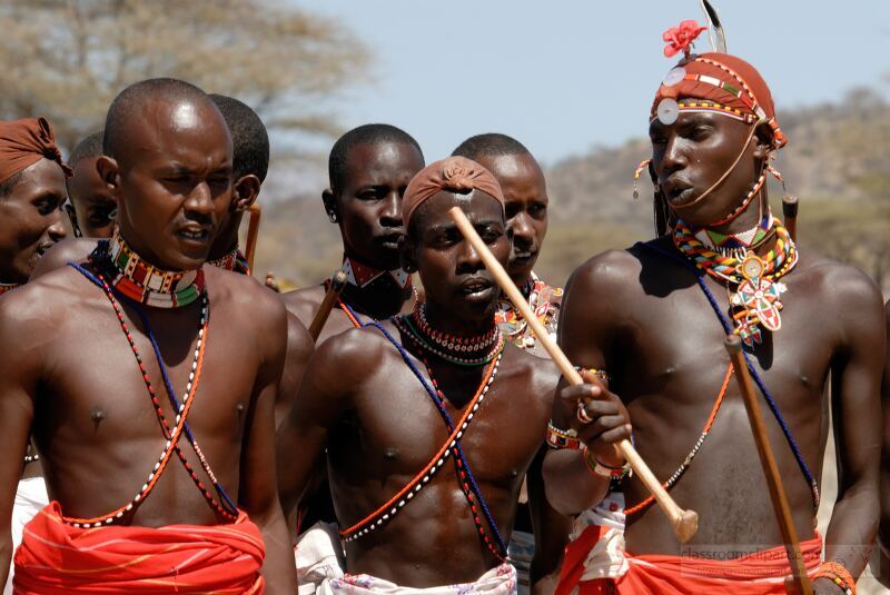 Samburu Tribe members showcase their cultural heritage through a lively dance ceremony in Kenya Dressed in vibrant attire these warriors express their identity and celebrate community through music movement and intricate jewelry