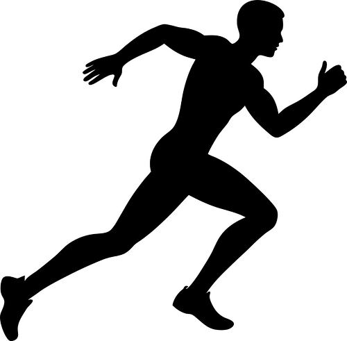 A runner is sprinting with great energy and speed outdoors